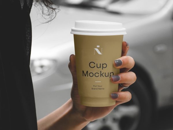 Woman Holding Coffee Cup Free Mockup