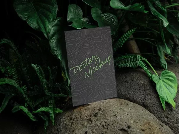 Free Poster Mockup on the Stones with Plants Behind
