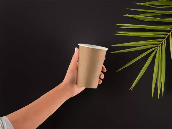 Hand Holding Paper Cup Mockup