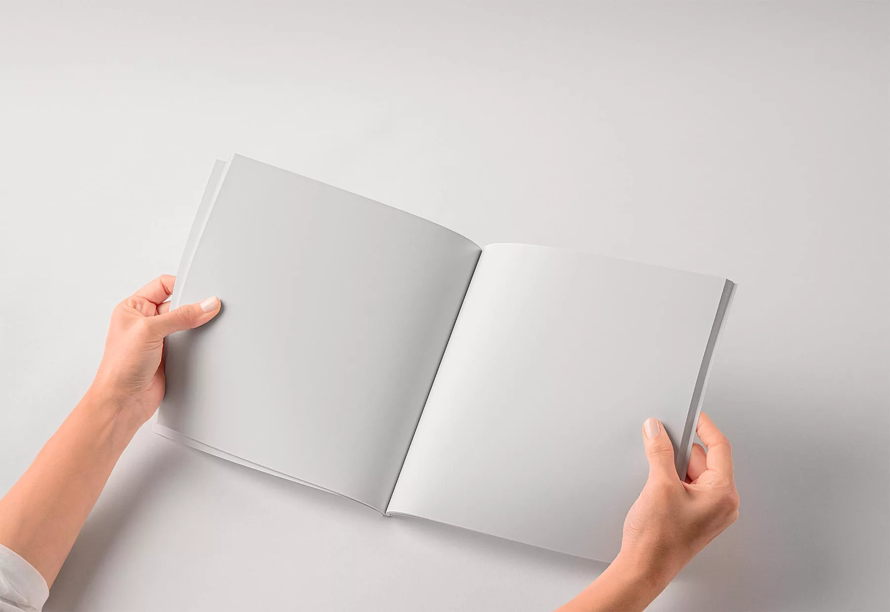Open Square Catalog/Book Mockup in Hands