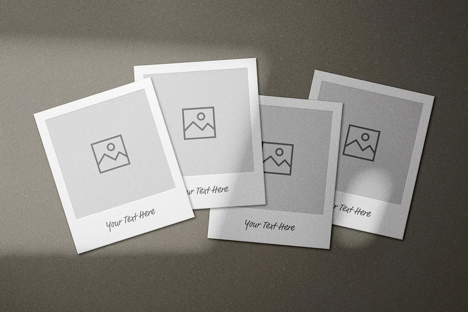 Free Polaroid Mockup Showcasing 4 Photos