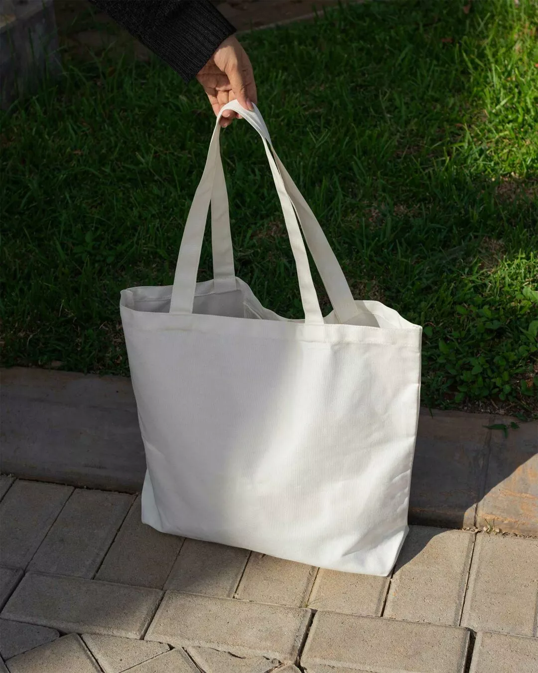 Canvas Tote Bag Mockup on Sidewalk Scene