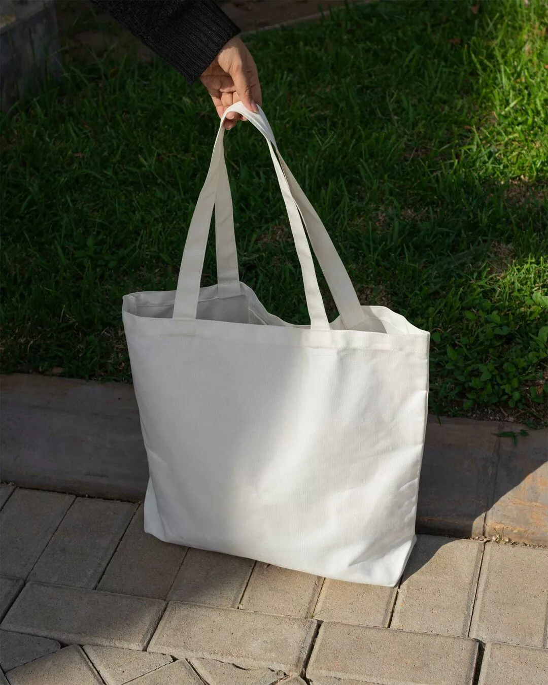 Canvas Tote Bag Mockup on Sidewalk Scene