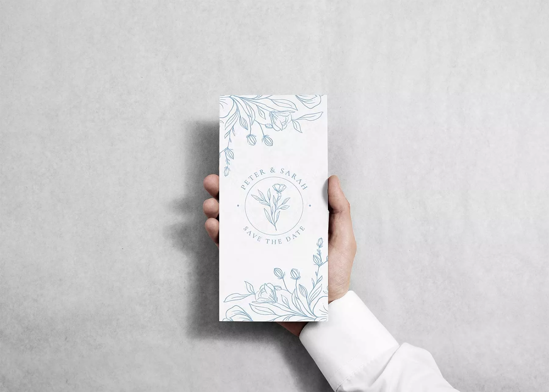Hand Holding Free DL Flyer Mockup