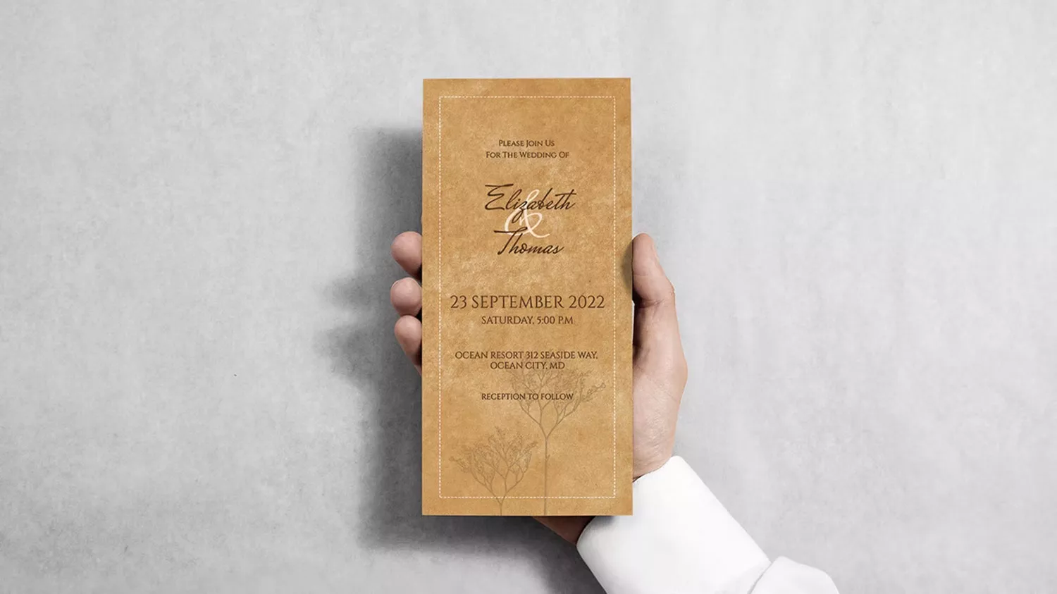 Hand Holding Free DL Flyer Mockup