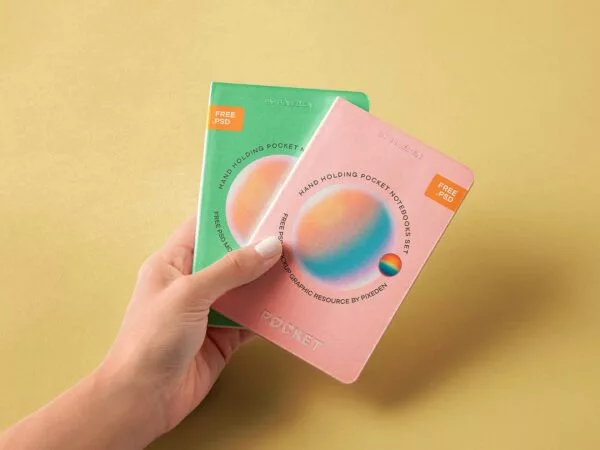 Hand Holding Pocket Notebook Free Mockups