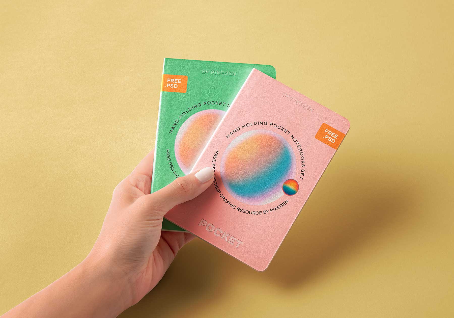 Hand Holding Pocket Notebook Free Mockups