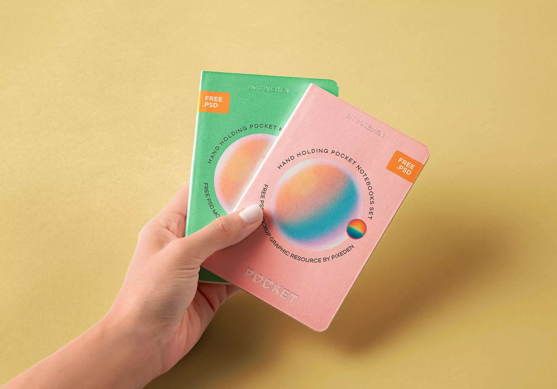 Hand Holding Pocket Notebook Free Mockups