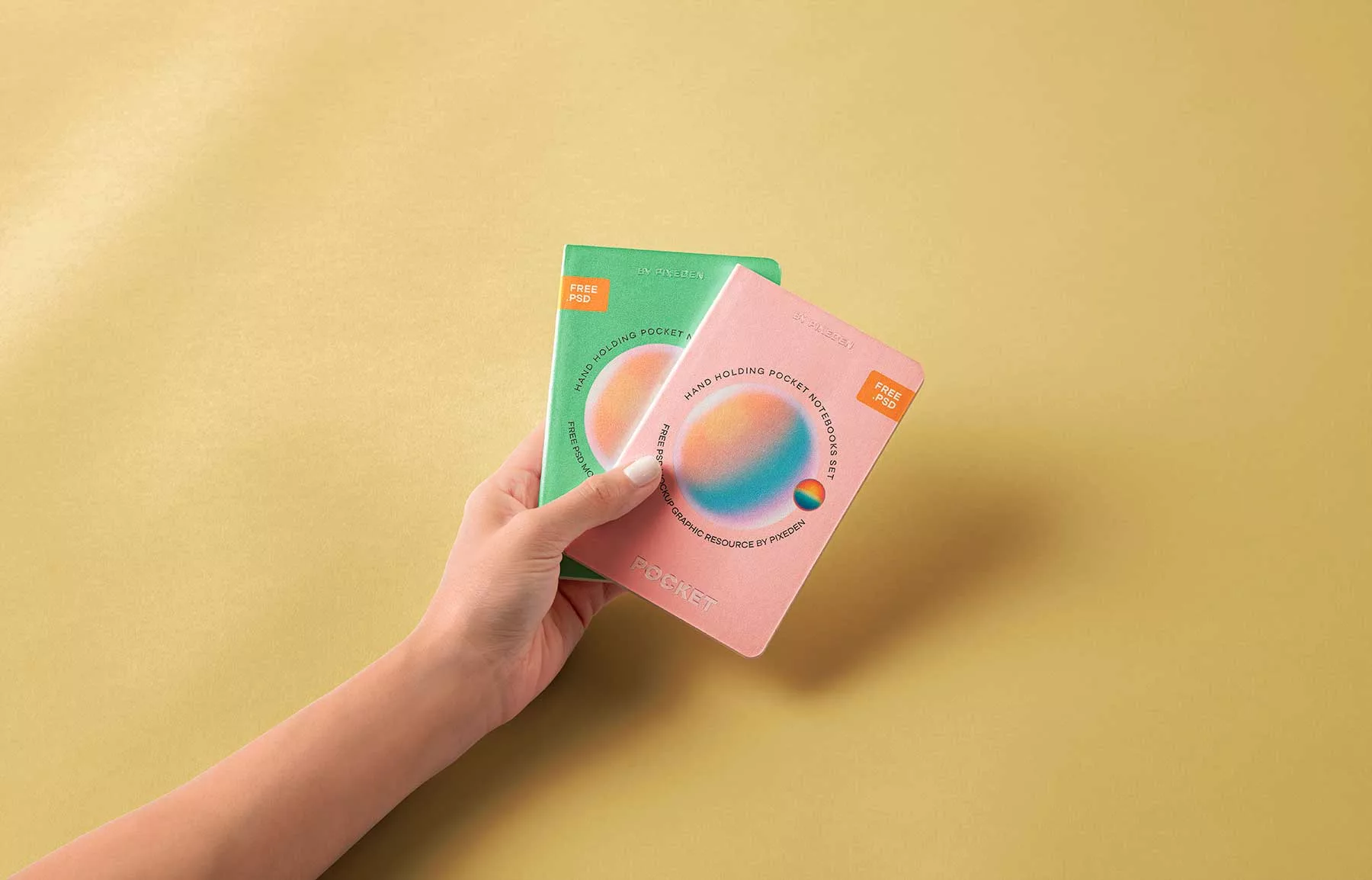 Hand Holding Pocket Notebook Free Mockups