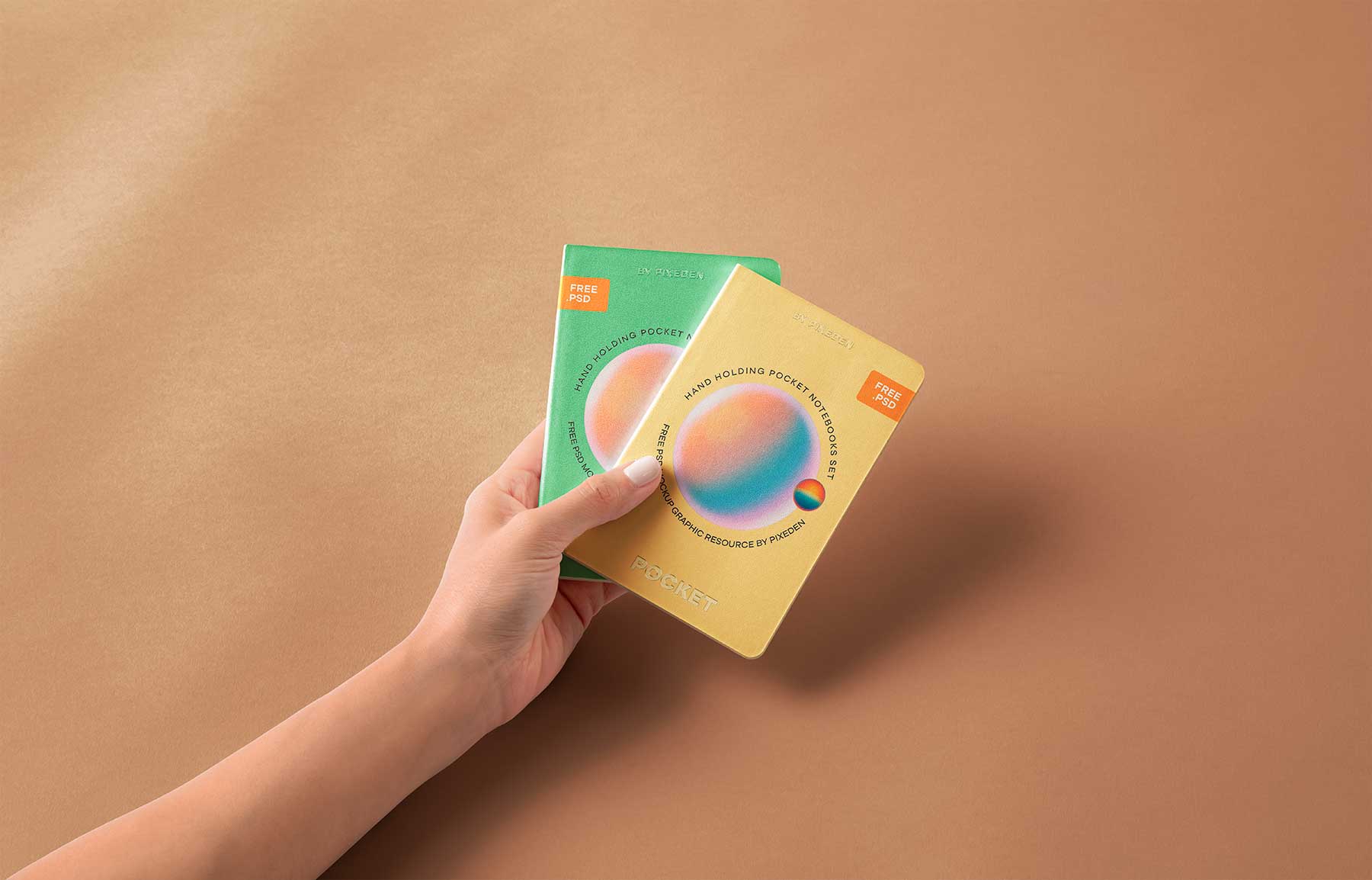 Hand Holding Pocket Notebook Free Mockups