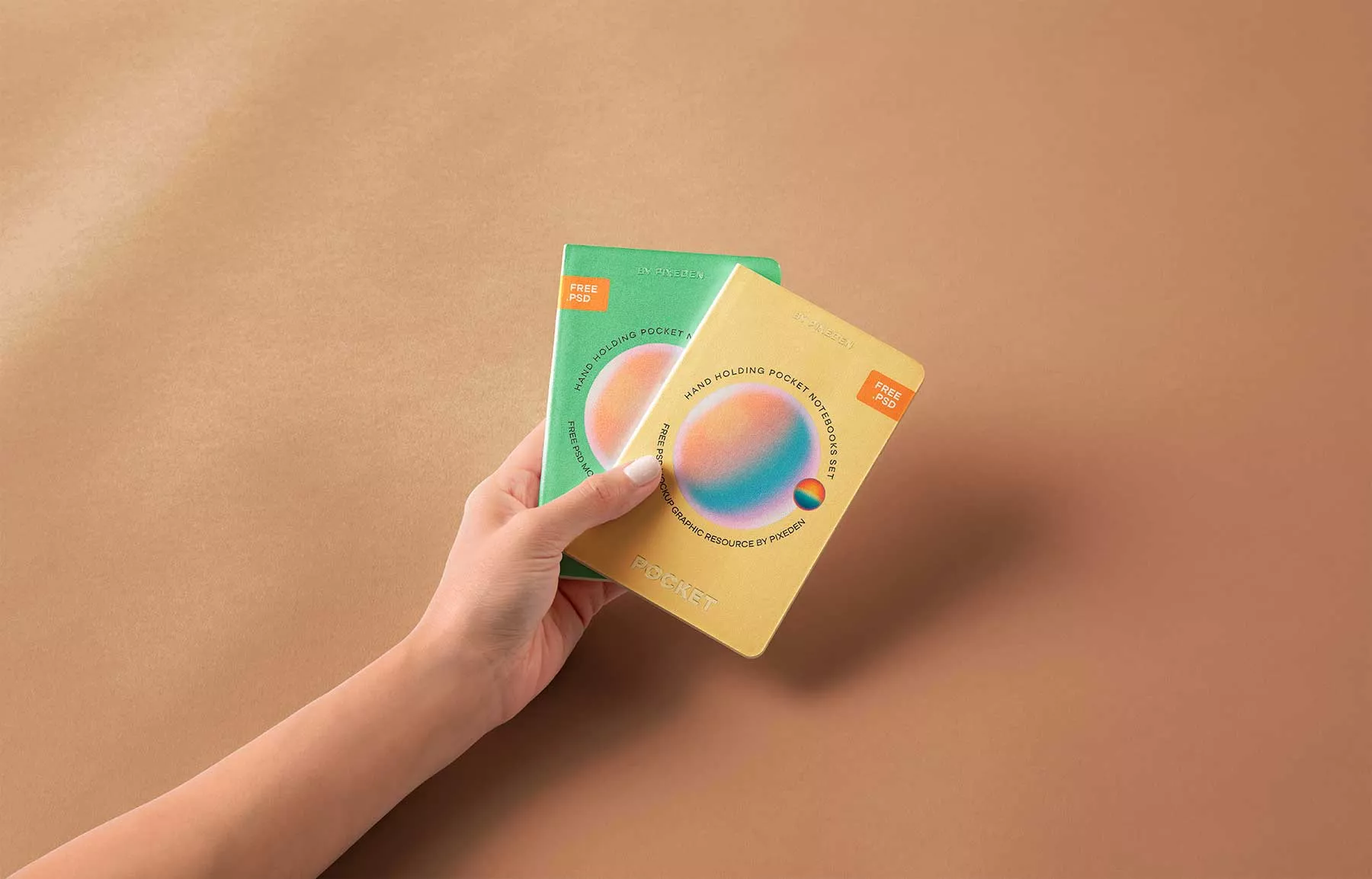 Hand Holding Pocket Notebook Free Mockups