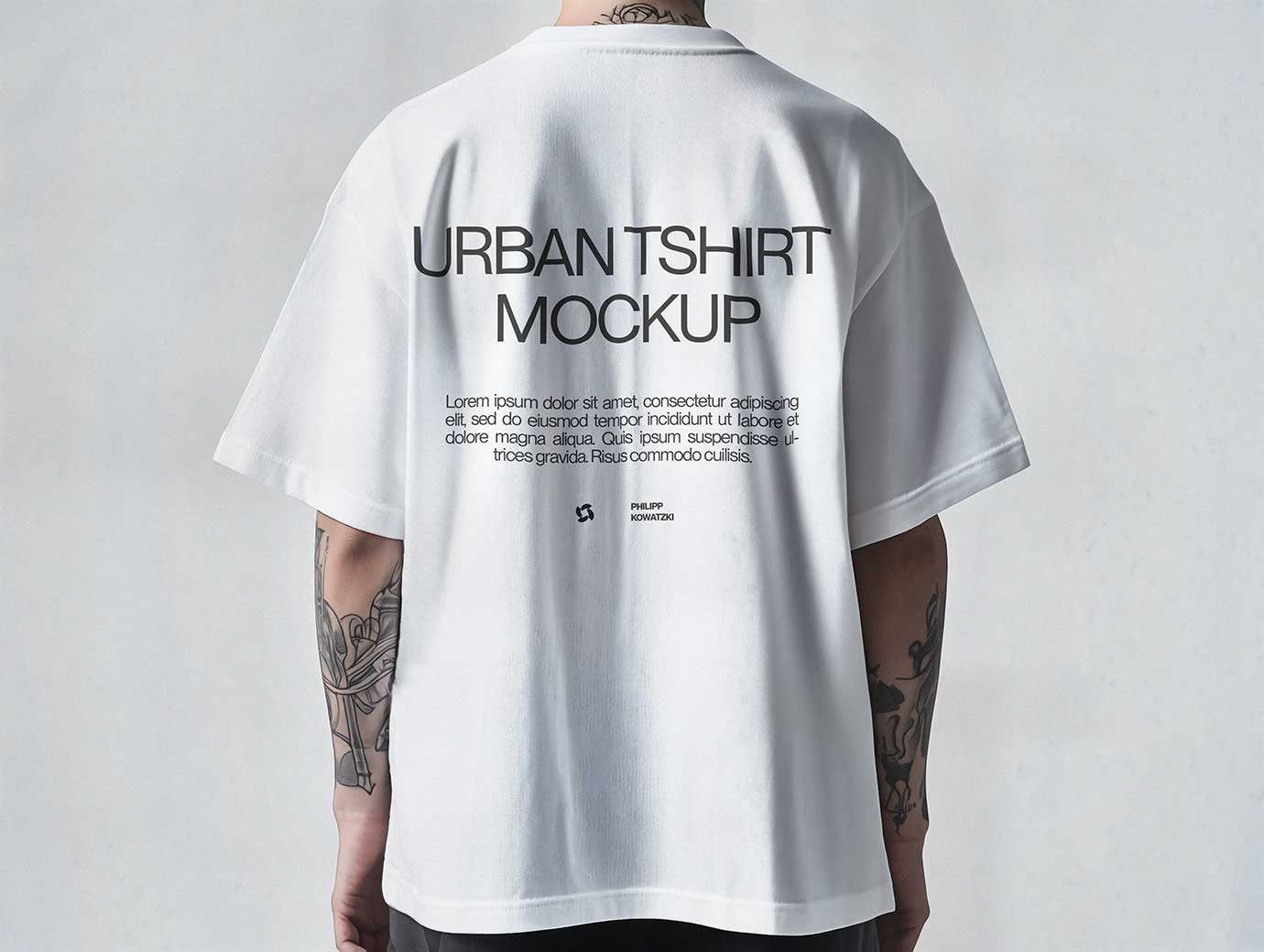Free Oversized T-Shirt Mockup – Back View on Tattooed Man