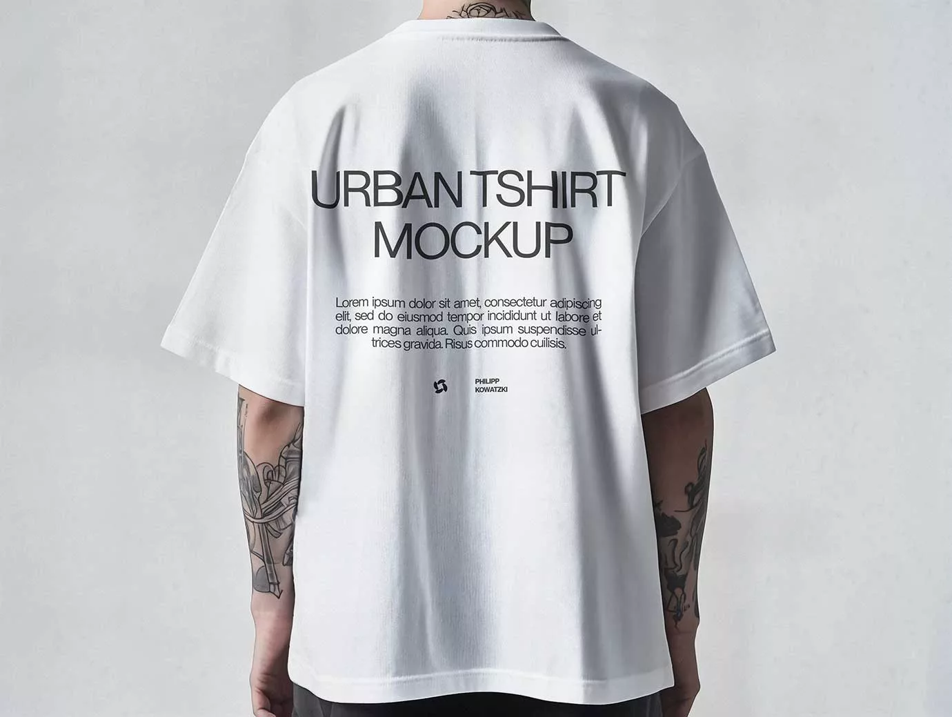 Free Oversized T-Shirt Mockup – Back View on Tattooed Man