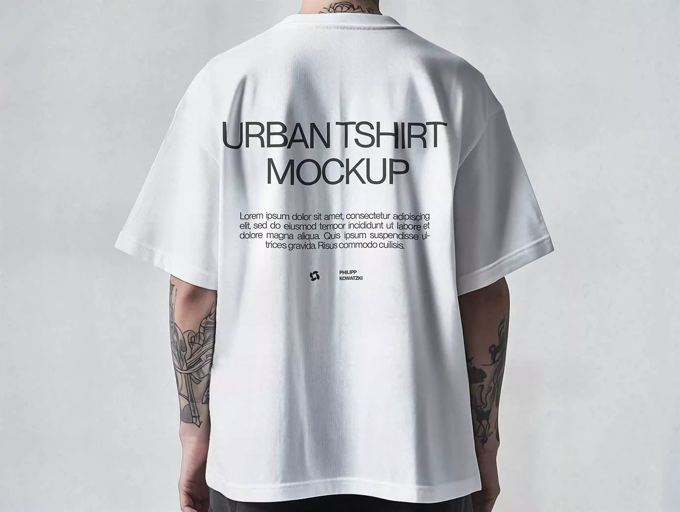 Free Oversized T-Shirt Mockup – Back View on Tattooed Man