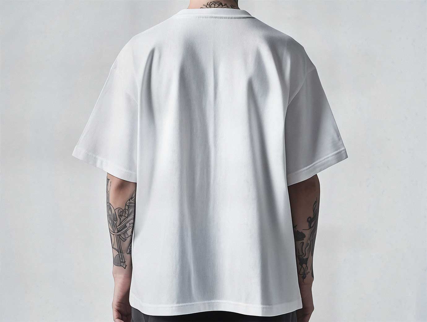 Free Oversized T-Shirt Mockup – Back View on Tattooed Man