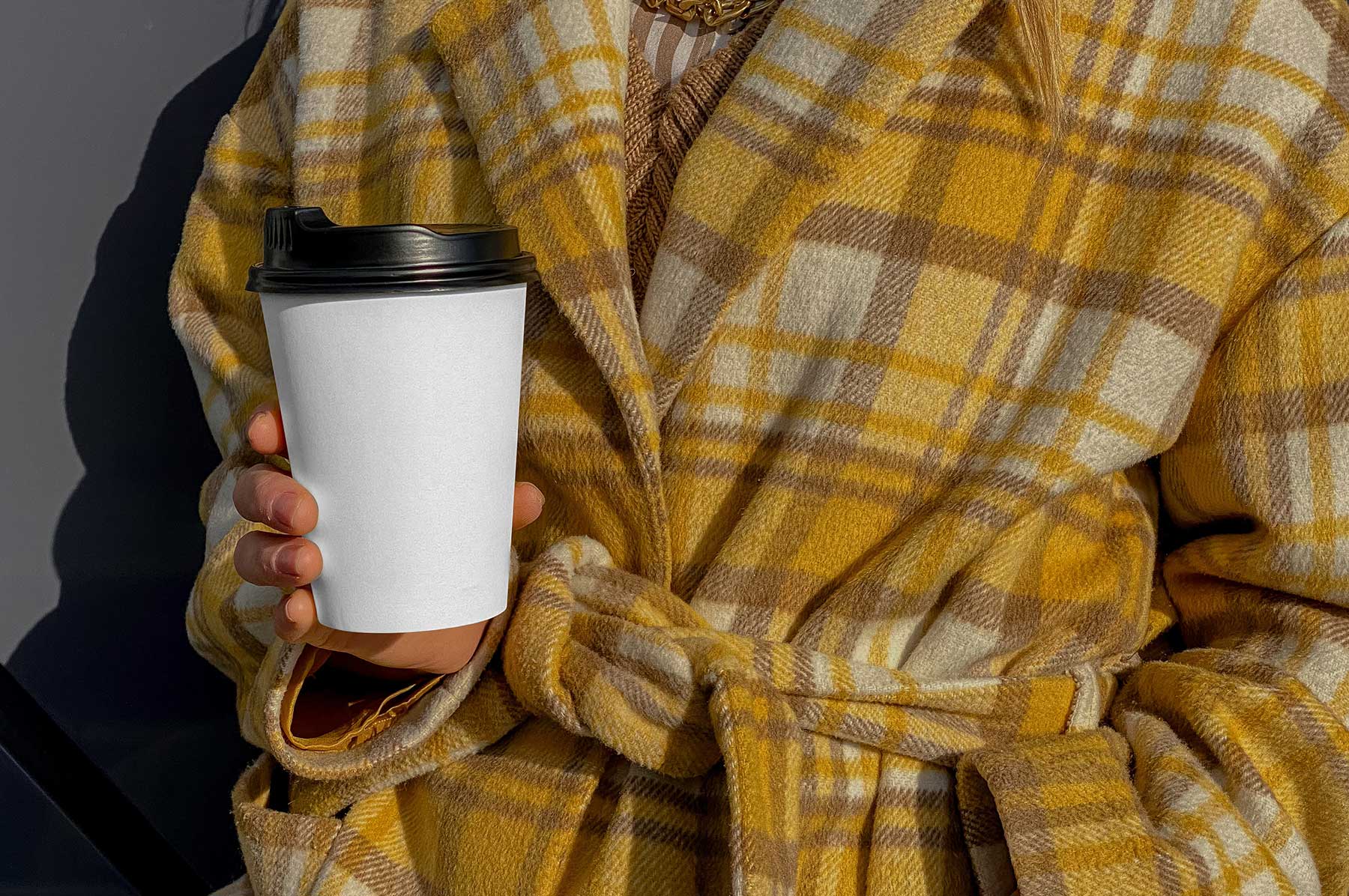 Coffee Cup in Hand Mockup