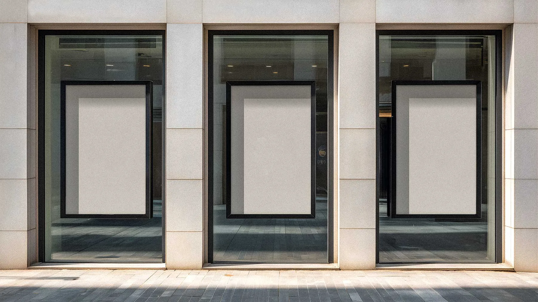 Storefront Facade with Three Urban Posters Mockup