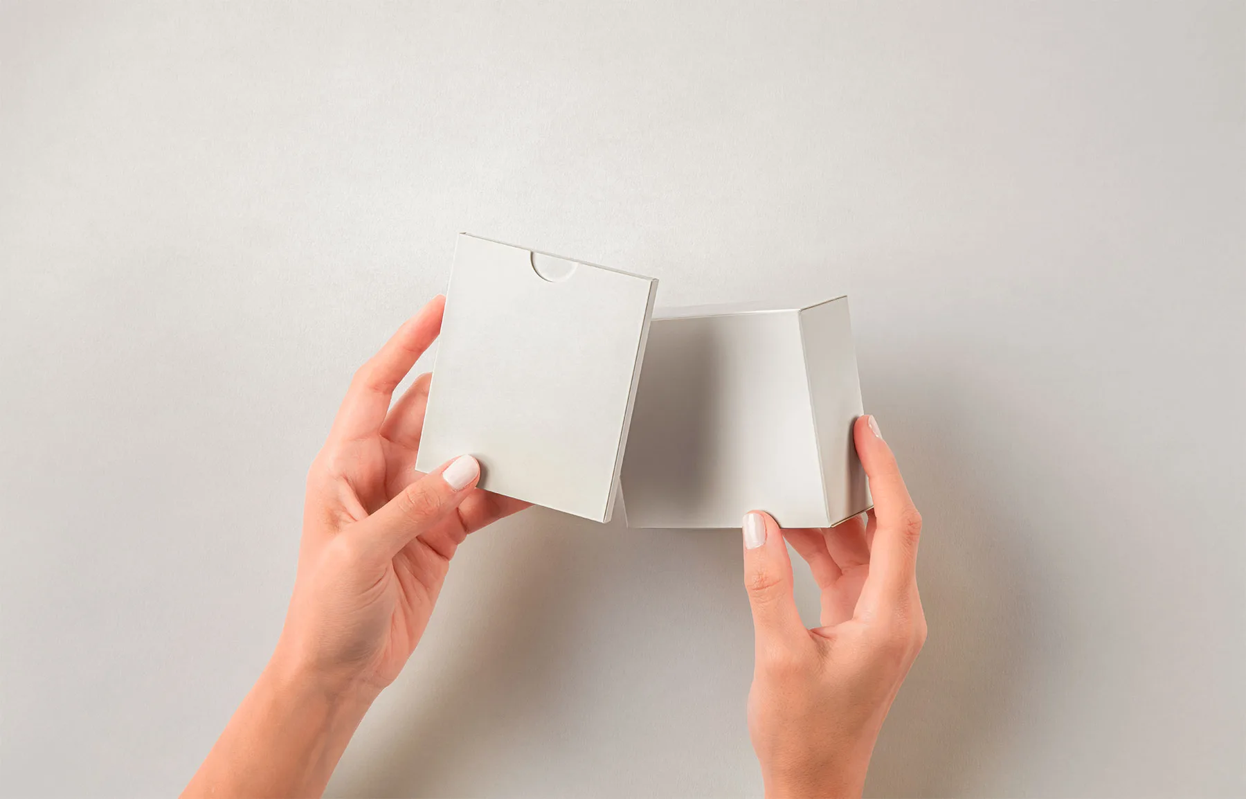 Hands Holding Product Boxes Mockup