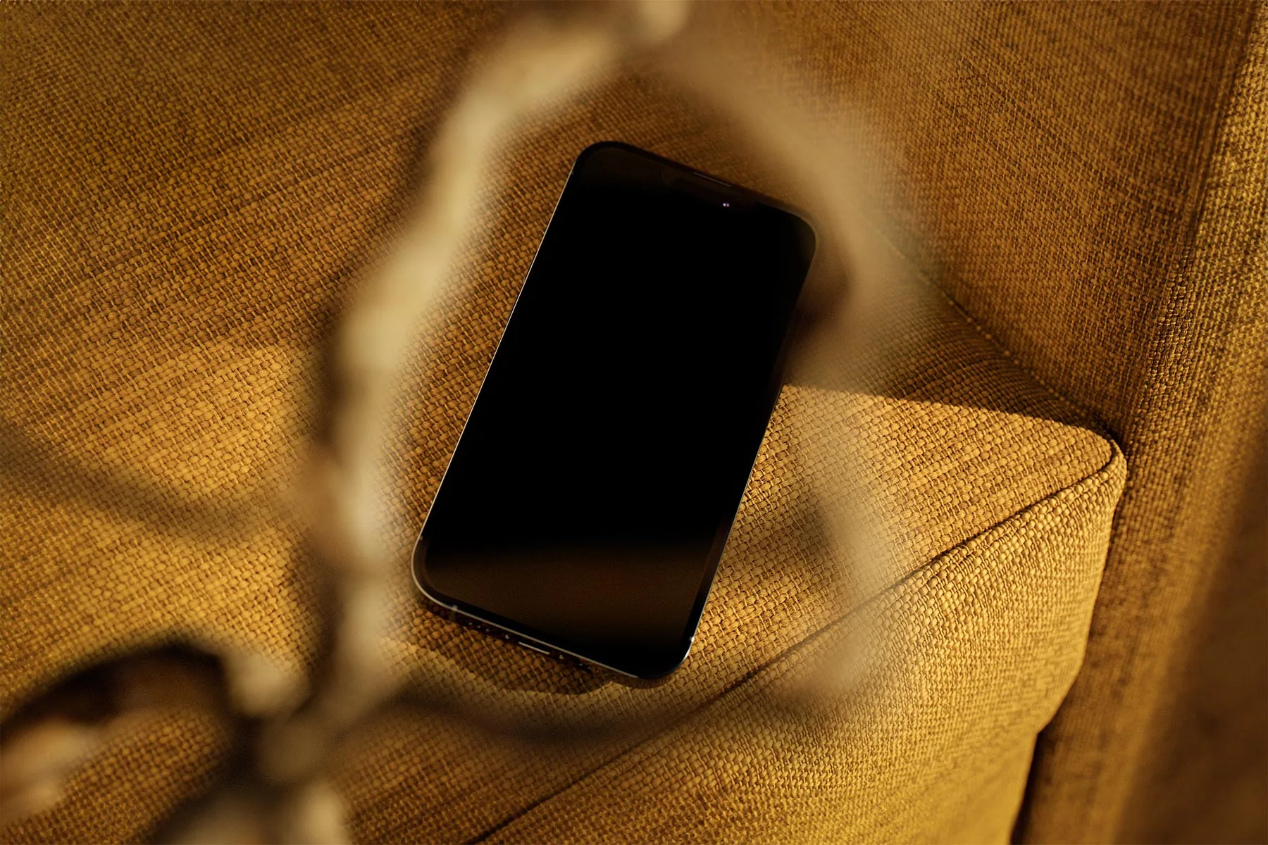 iPhone on Armchair Mockup (App Presentation)
