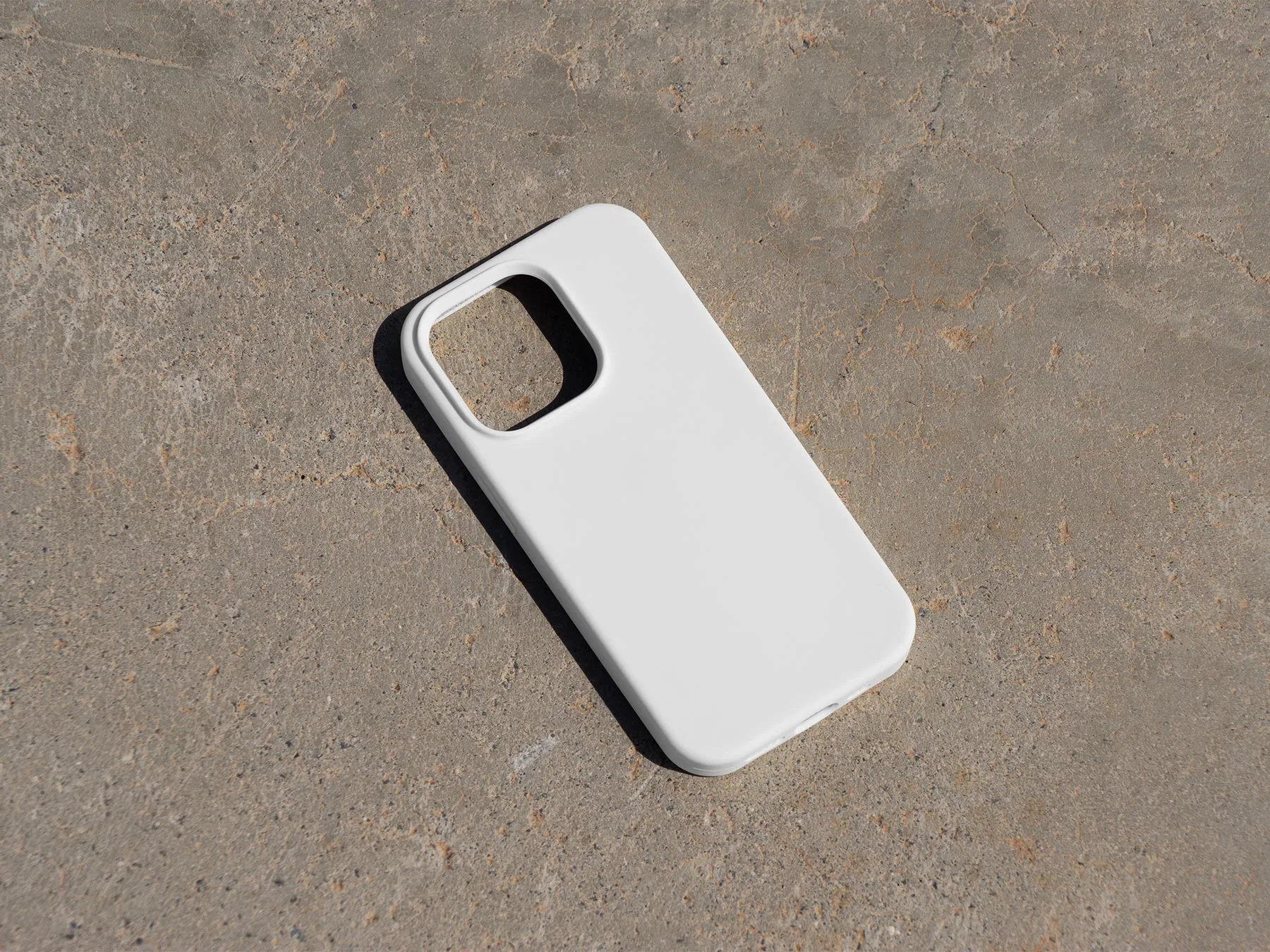 iPhone Case Mockup on Concrete Surface