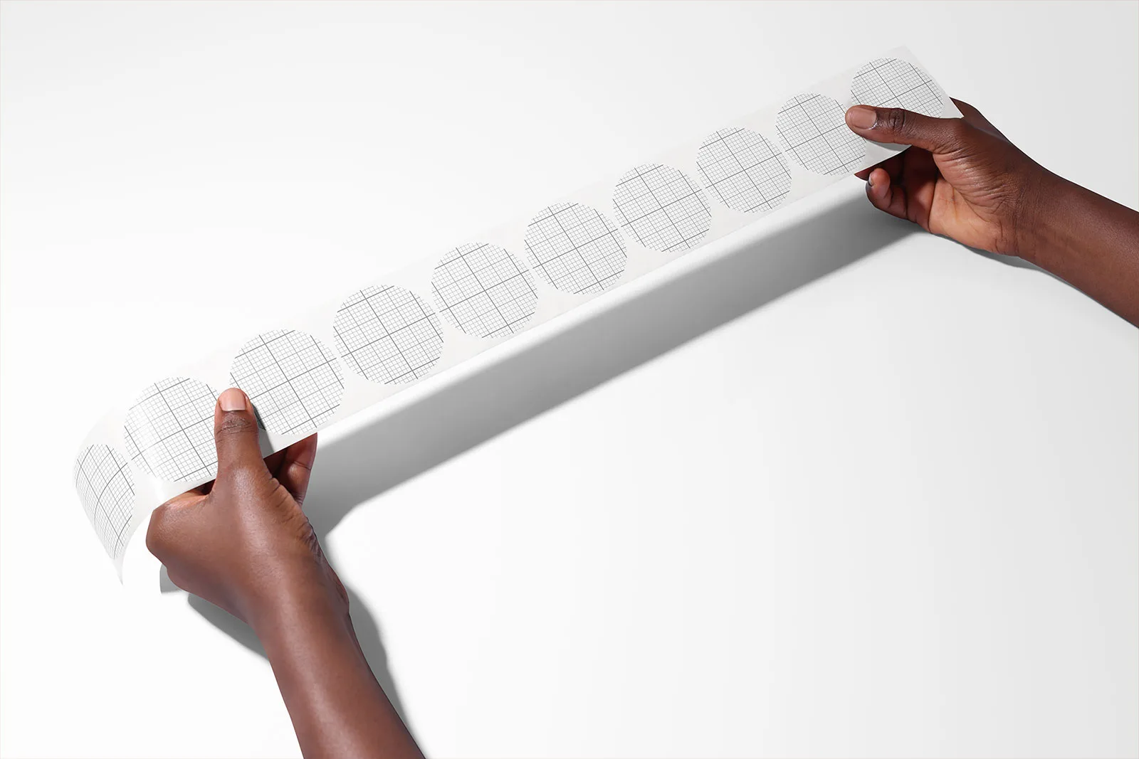 Round Sticker Tape Mockup in Hands