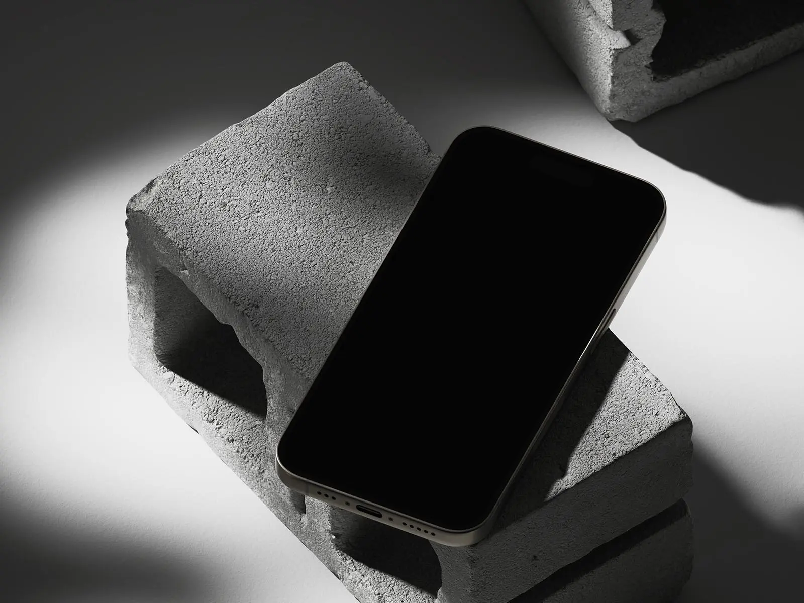 Smartphone Mockup on Brick Surface