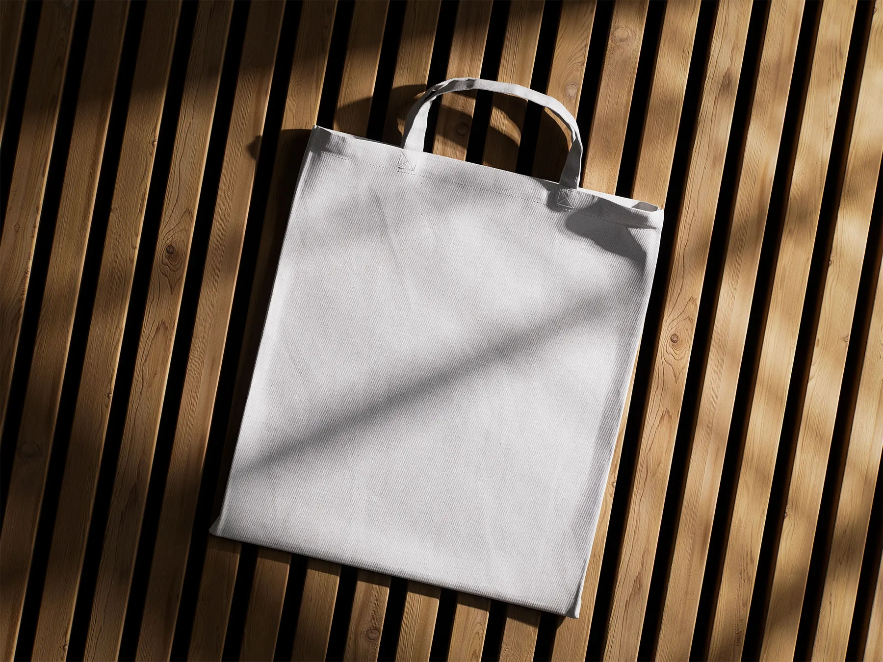 Tote Bag Mockup Set on Wooden Surface