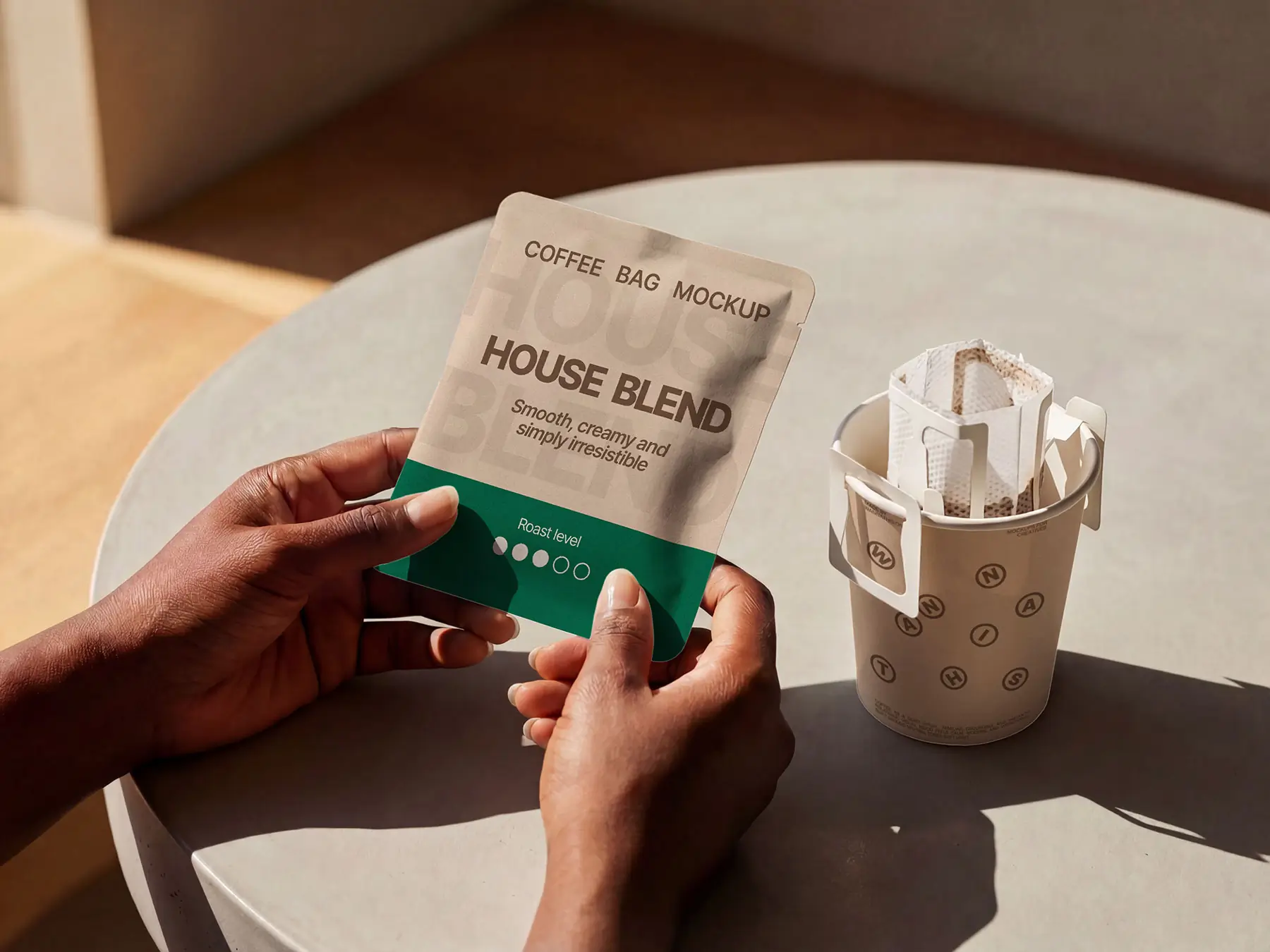 Drip Coffee Bag in Hand Mockup