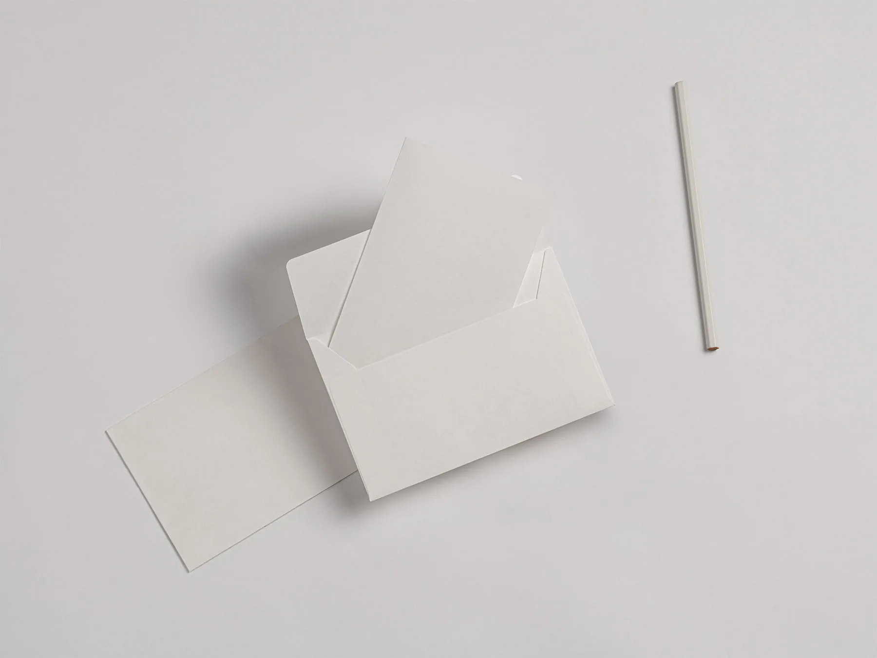 Open Envelope with Invitation Card Mockup (Free PSD)