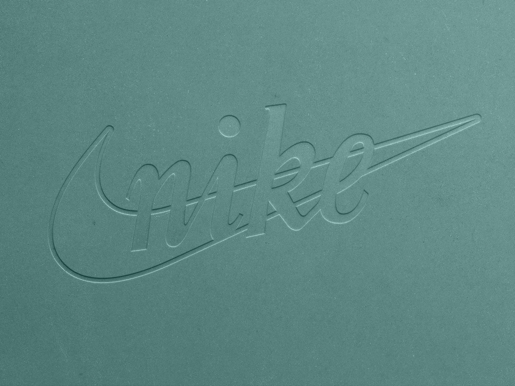 Free Debossed Logo Mockup on Pressed Paper