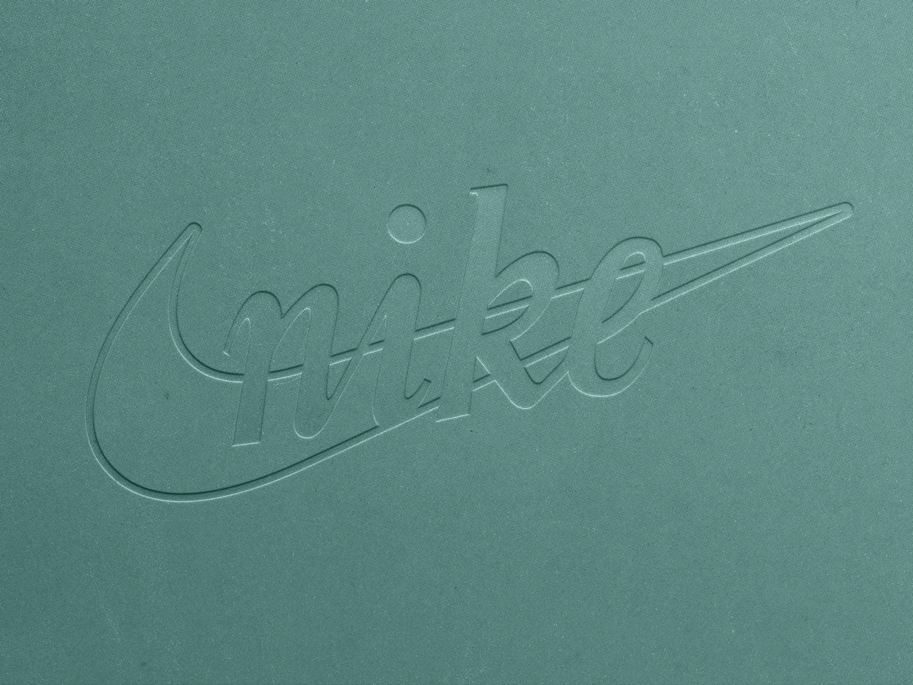 Free Debossed Logo Mockup on Pressed Paper