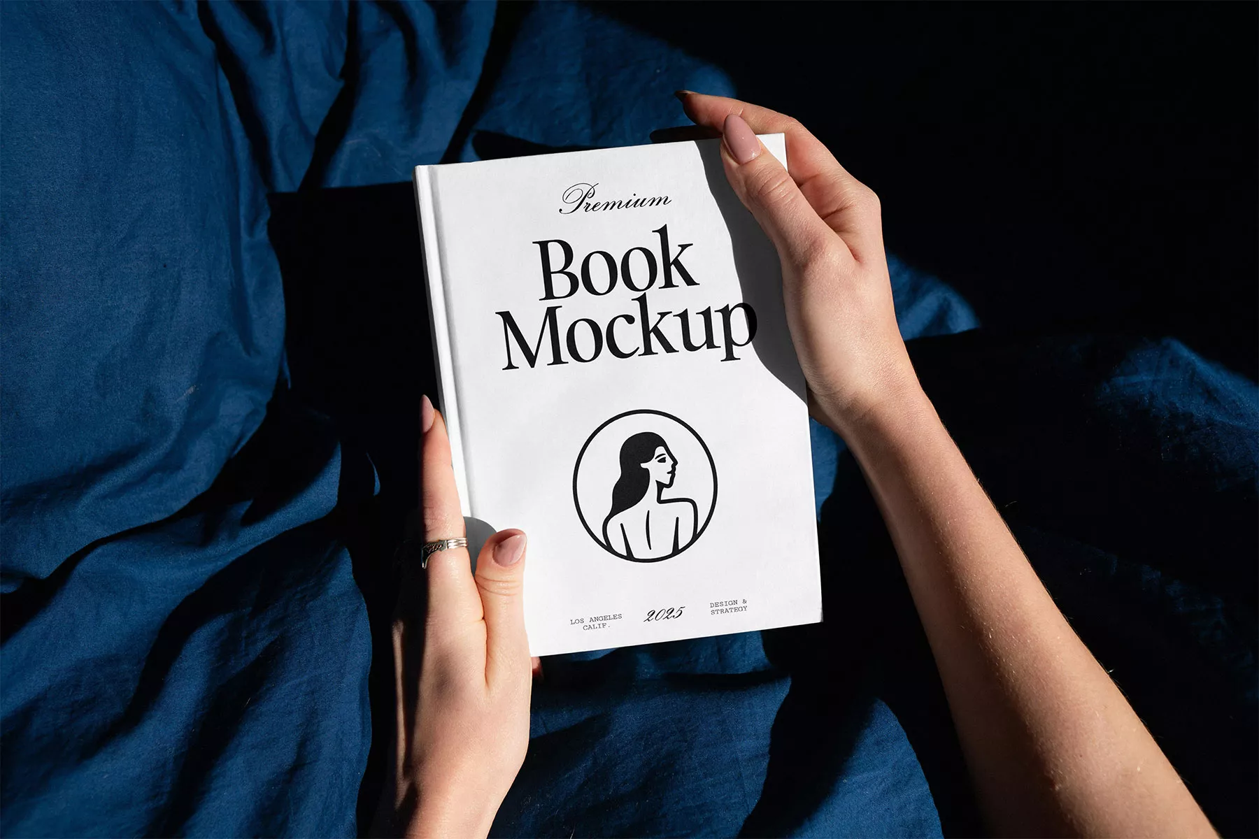 Free Hardcover Book Mockup held in Hands