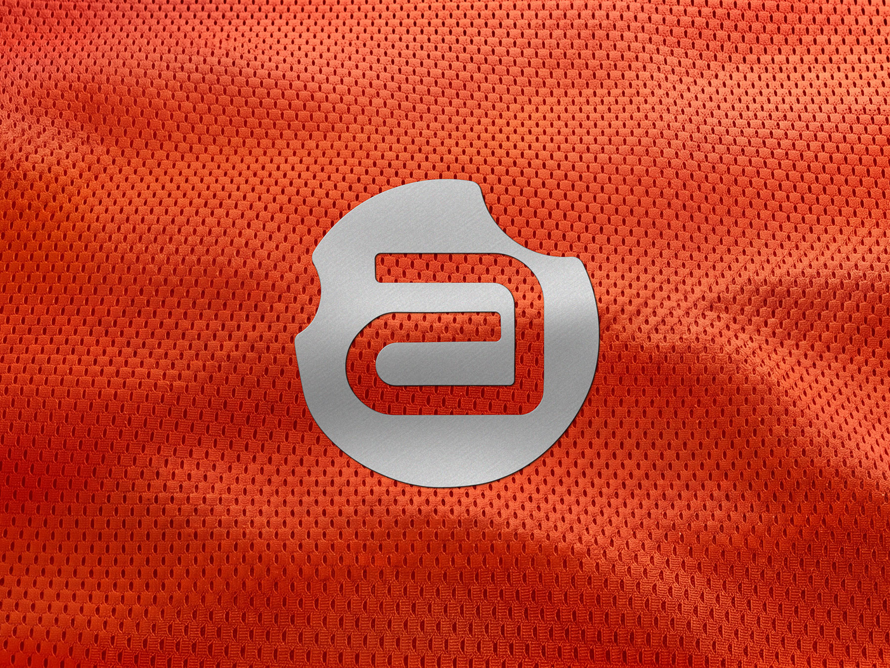 Free Sports Jersey Logo Mockup on Mesh Fabric