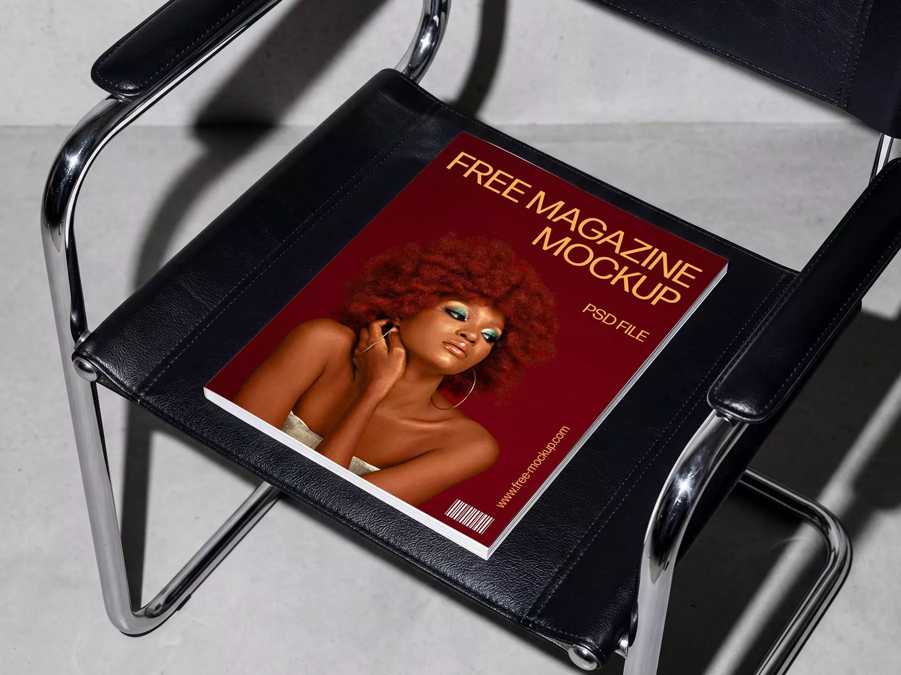 Magazine Mockup on Minimalist Leather Chair (Free Download)