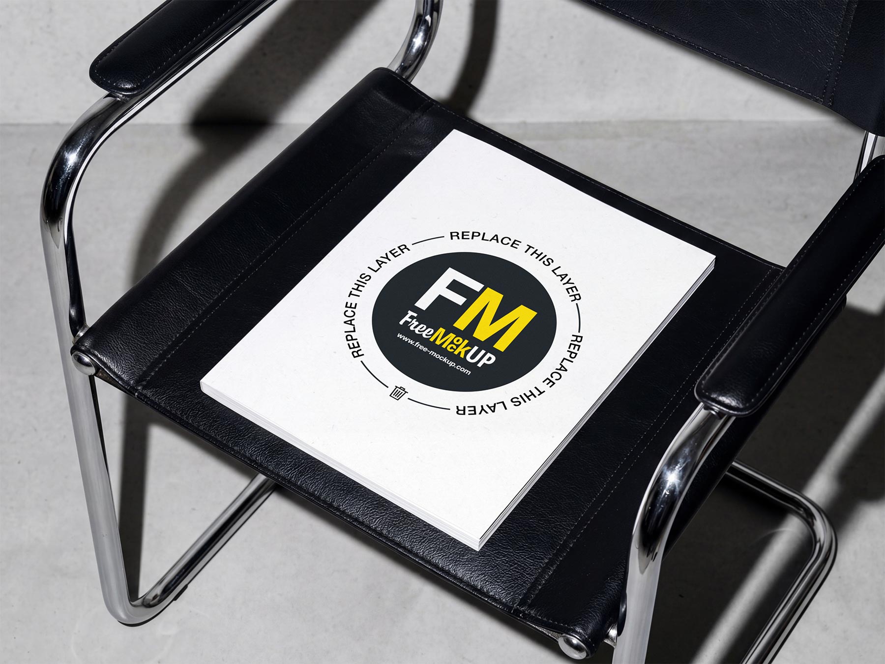 Magazine Mockup on Minimalist Leather Chair (Free Download)