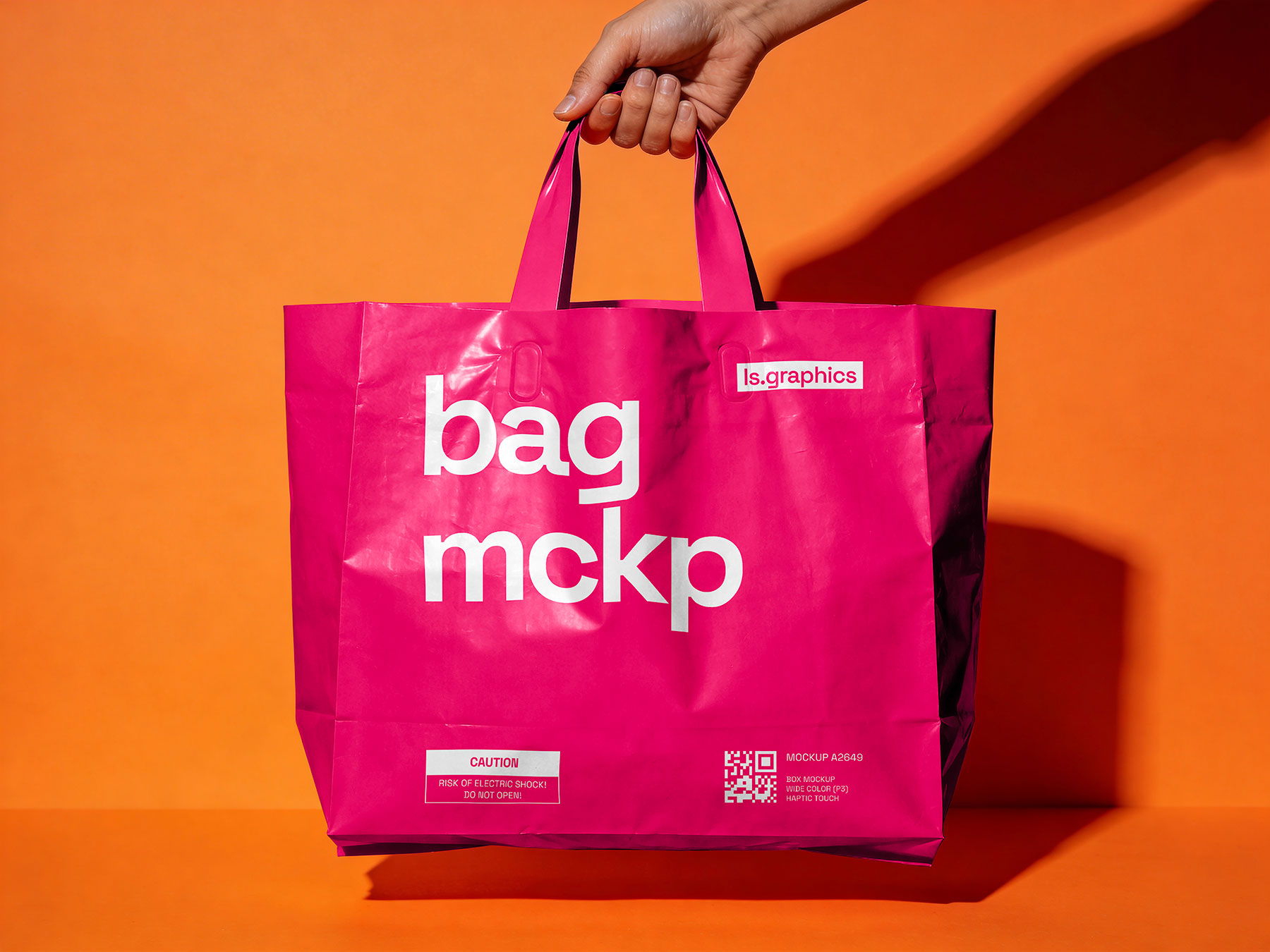Shopping Bag Mockup in Hand – Glossy Paper Bag