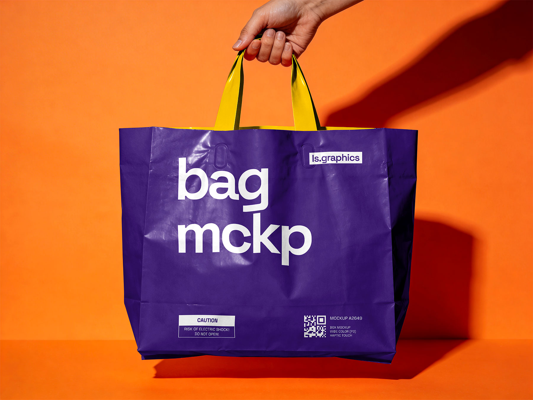 Shopping Bag Mockup in Hand – Glossy Paper Bag