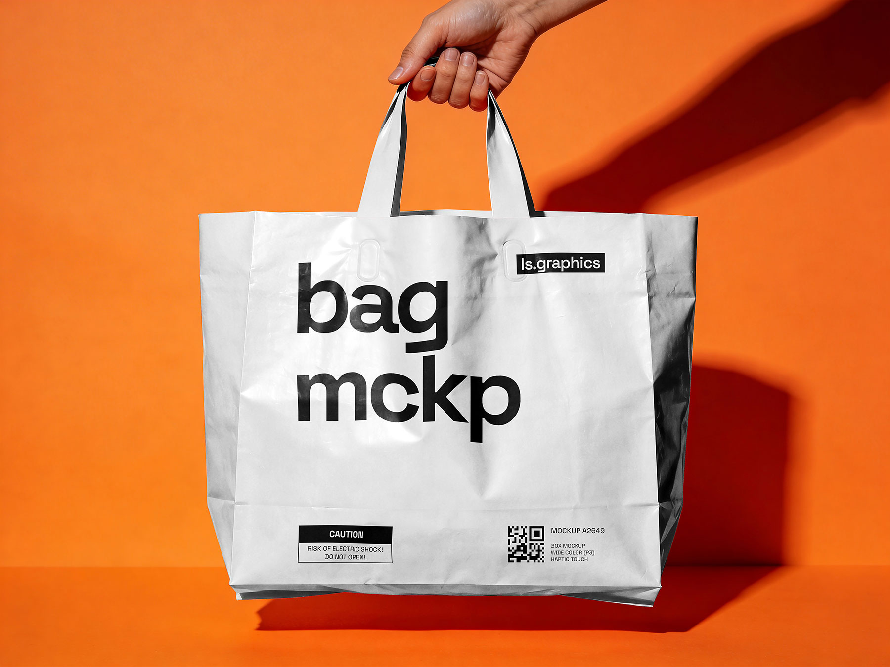 Shopping Bag Mockup in Hand – Glossy Paper Bag