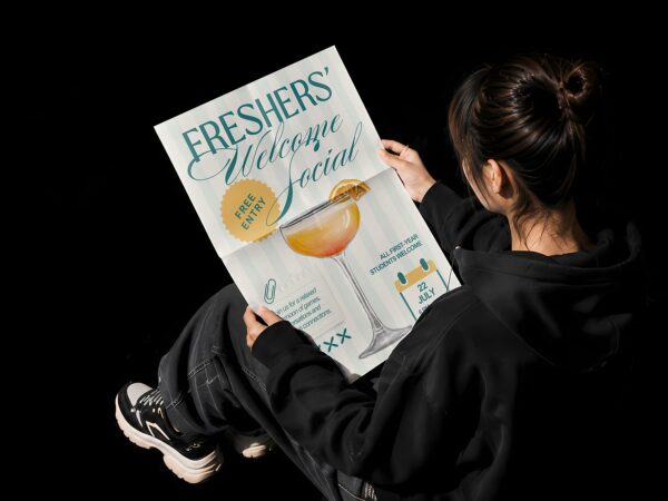 Free Poster in Hands Mockup PSD – Folded Paper Display