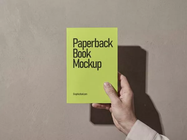 Free Hand Holding Paperback Book Mockup – Cover Display