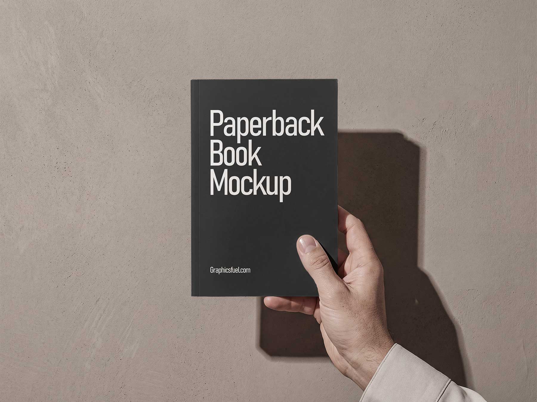 Free Hand Holding Paperback Book Mockup – Cover Display