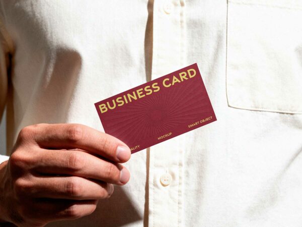Man Holding Horizontal Business Card Free Mockup