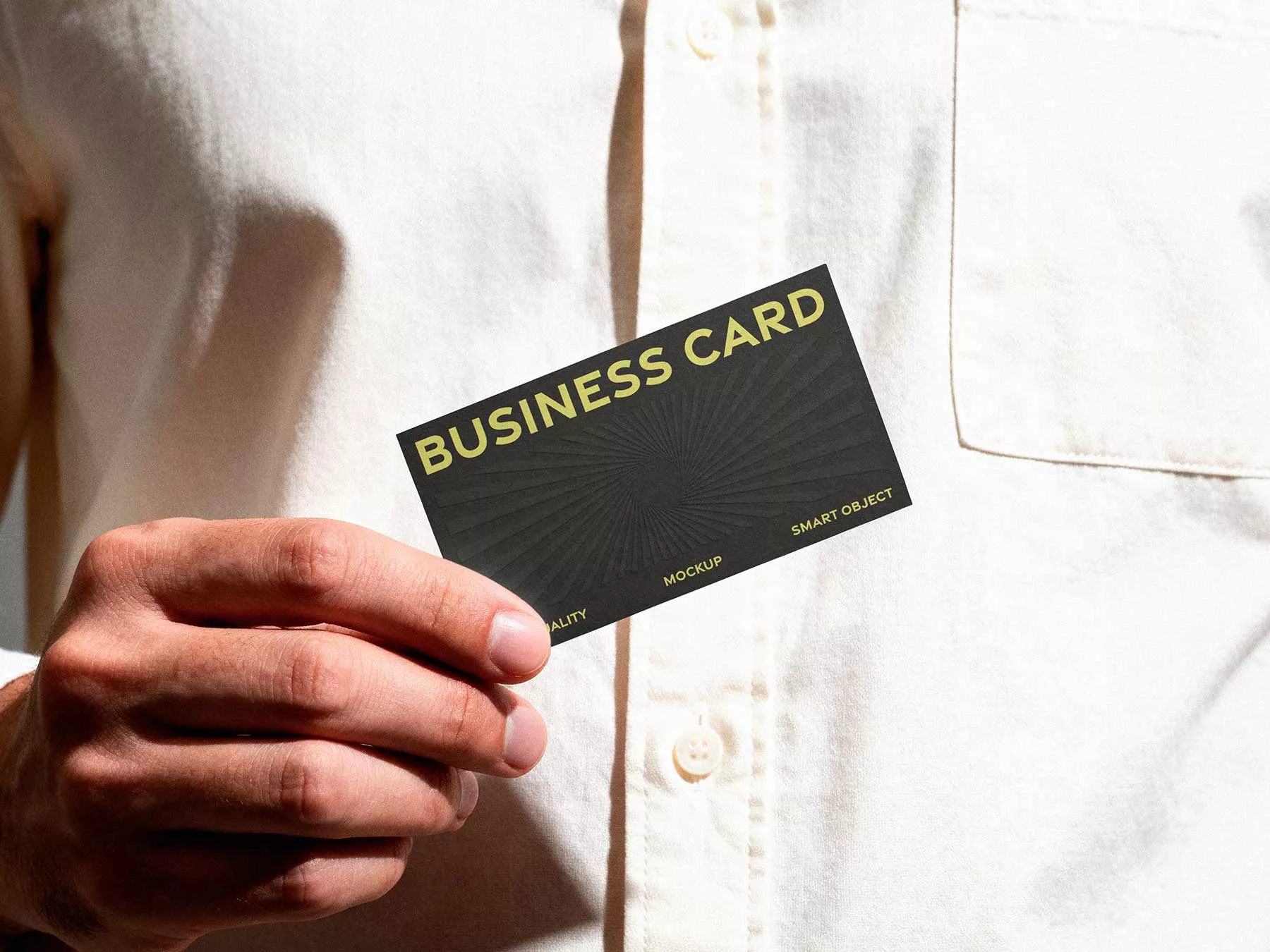 Man Holding Horizontal Business Card Free Mockup