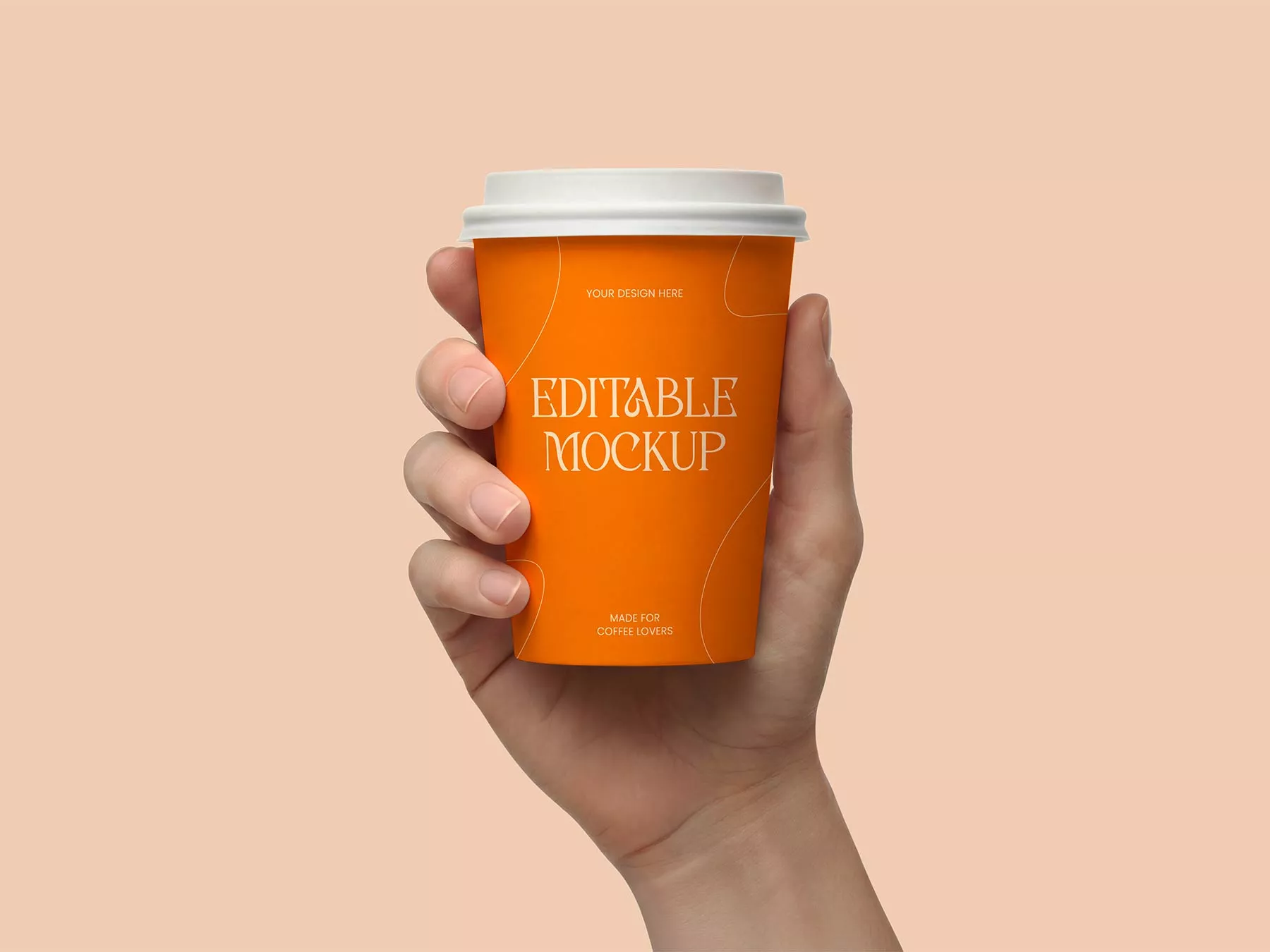Free Paper Coffee Cup Mockup Held by Hand