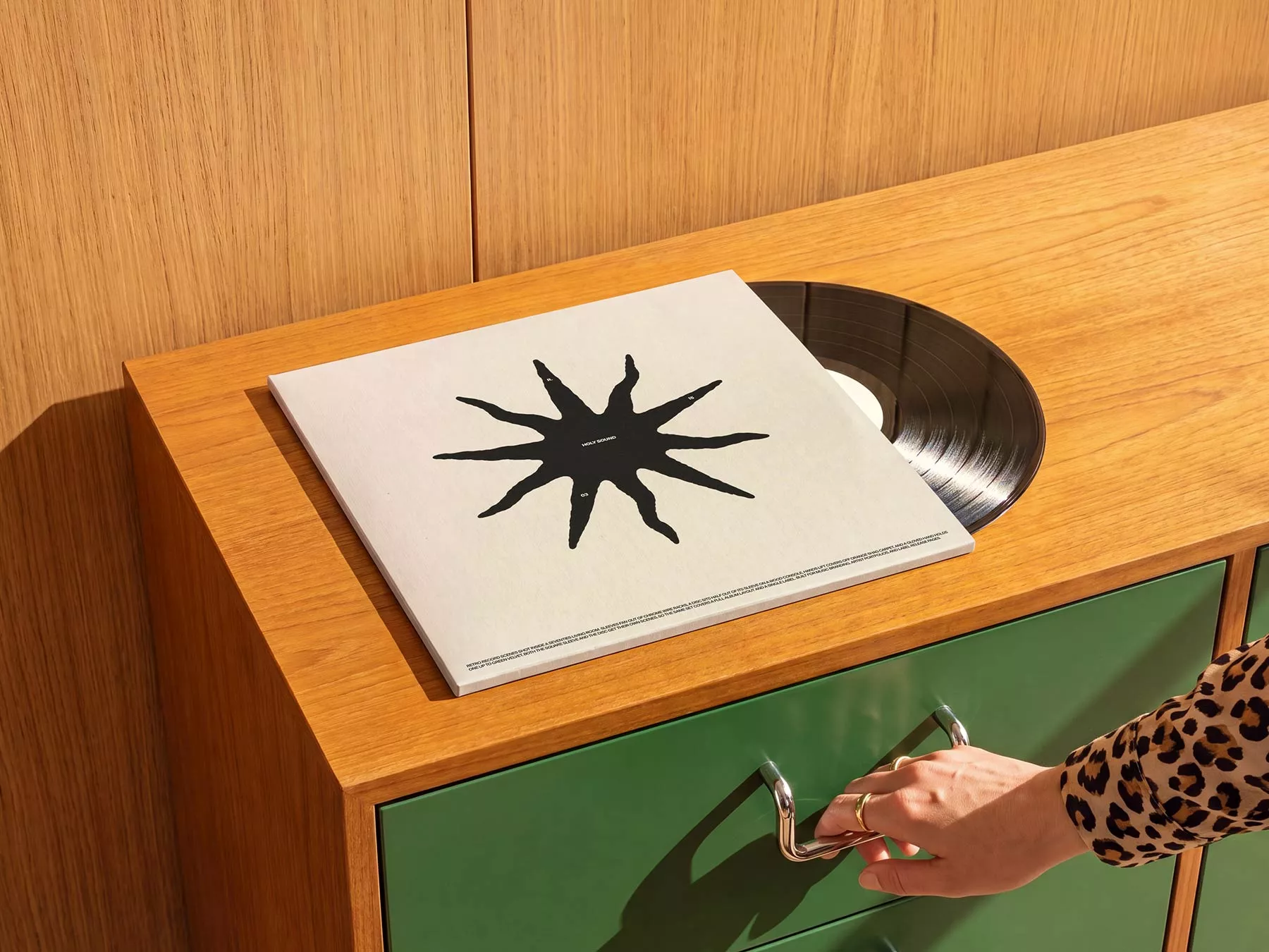 Free Vinyl Record Cover Mockup on Wooden Cabinet