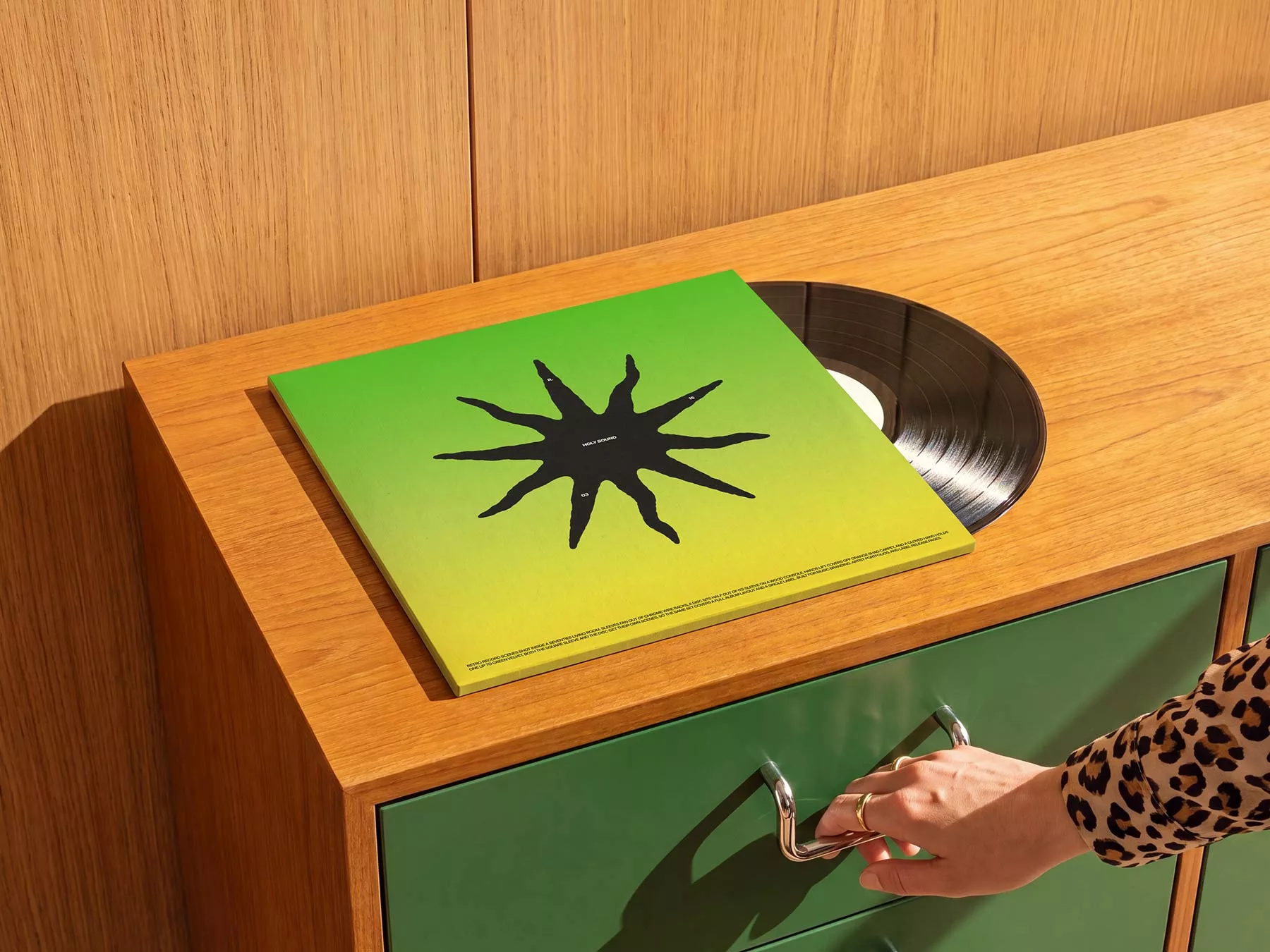 Free Vinyl Record Cover Mockup on Wooden Cabinet