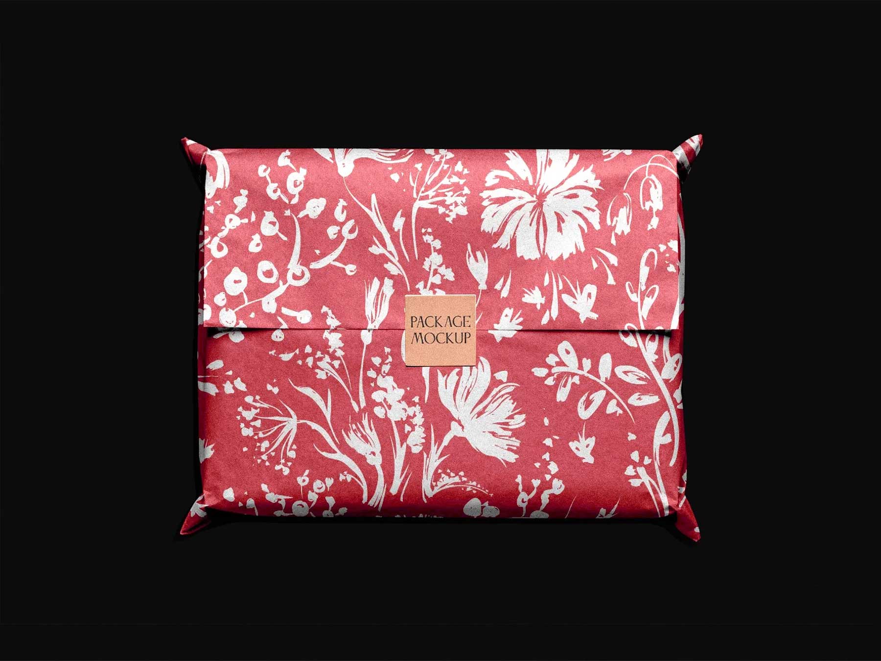 Free Wrapped Gift Package Mockup with Sticker