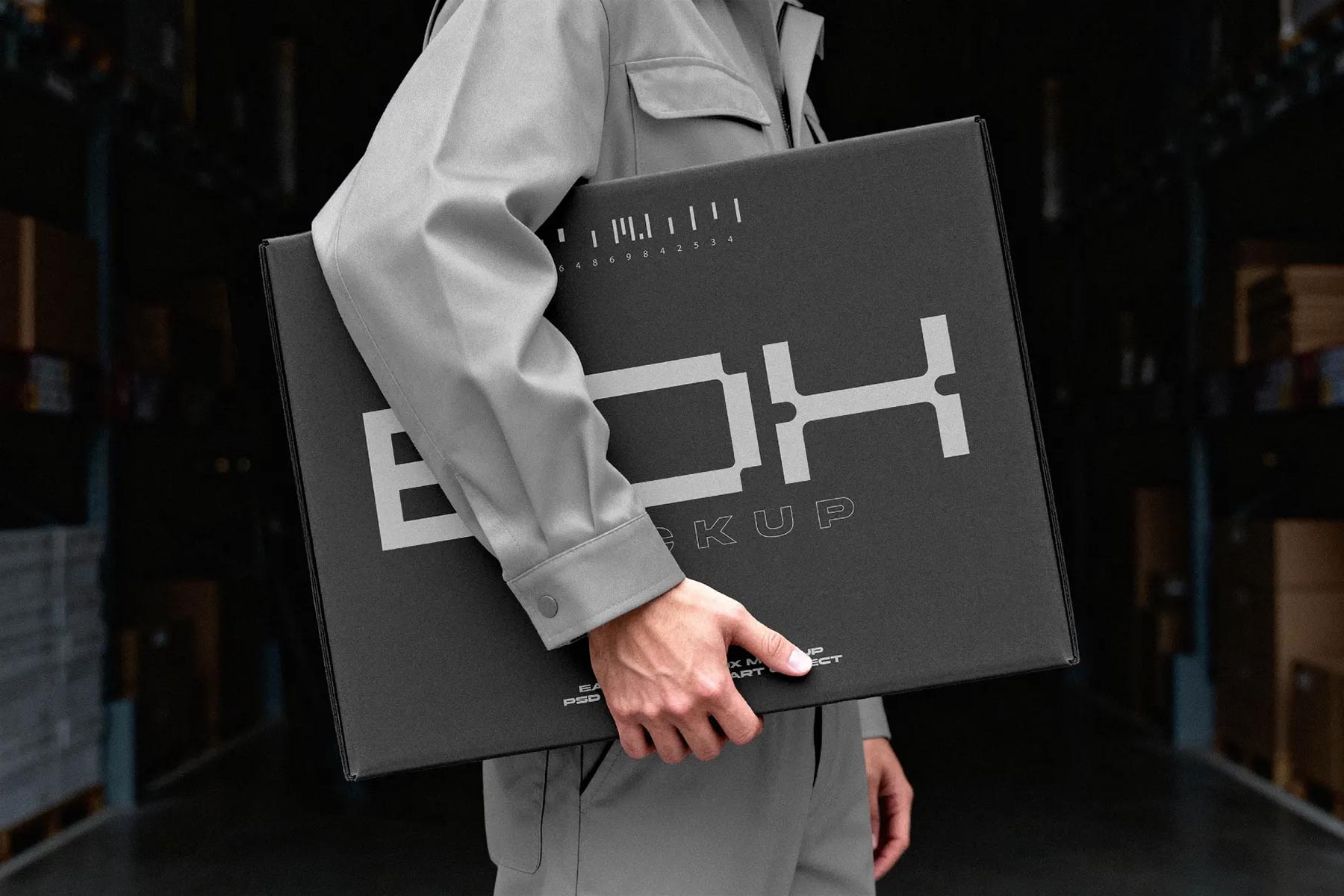 Mailing Box Free Mockup Carried by Courier – Shipping Packaging