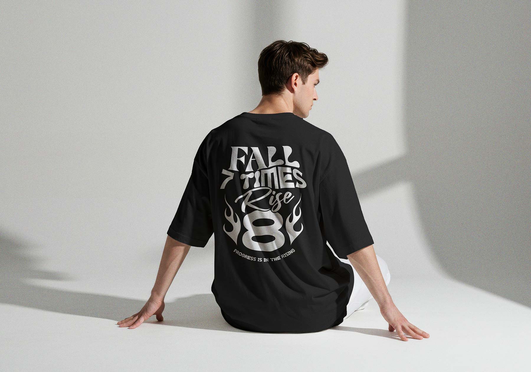 Man Sitting in Oversized T-Shirt Back View Mockup