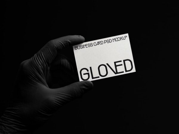 Free Business Card Mockup Held in Gloved Hand
